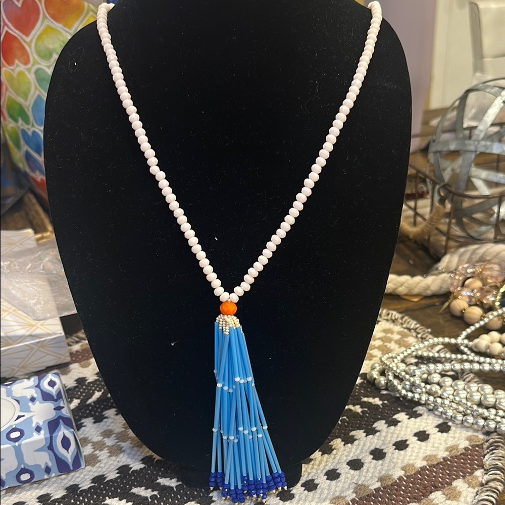 Elegant Beaded Necklace with Blue Tassel